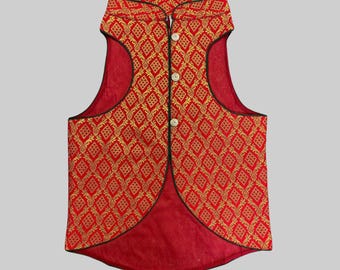 May include: A red sleeveless vest with a gold patterned design and black trim. The vest has a mandarin collar and a button closure.