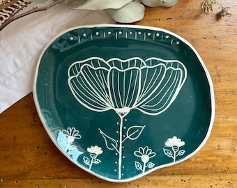 Magnolia ceramic plate with sgraffito decoration