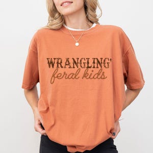 Wrangling Feral Kids Png, Western Shirt, Funny Mom Shirt, Western Mama Png, Feral Kids Png, Raccoon Shirt, Funny Kids Png, Country Mom Png