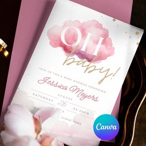 May include: Pink and white watercolor baby shower invitation with gold lettering. The invitation says "OH baby!" and includes the date, time, and location of the event. The invitation is decorated with gold stars.