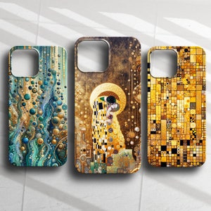 May include: Three phone cases with different designs. The first case features a blue and gold abstract pattern. The second case features a gold and white painting of two people kissing. The third case features a gold and yellow mosaic pattern.
