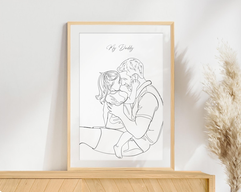 May include: Line art drawing of a father and daughter hugging. The drawing is in black and white and the text "My Daddy" is at the top of the image.