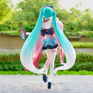 Hatsune Miku kawaii girl figure displayed with other anime collectibles