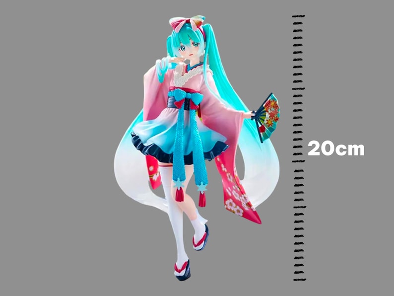 Hatsune Miku kawaii girl figure displayed with other anime collectibles