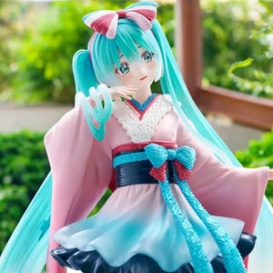 Hatsune Miku kawaii girl figure displayed with other anime collectibles
