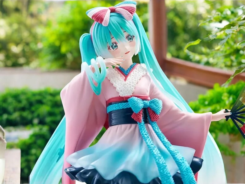 Hatsune Miku kawaii girl figure displayed with other anime collectibles