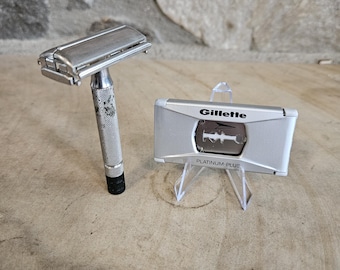 Vintage Gillette Super Speed safety razor along with a case of Gillette Platinum-Plus blades