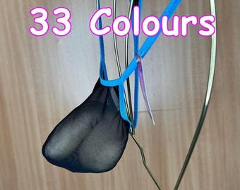 May include: A blue and black thong-style undergarment. The garment features a blue waistband and straps, with a black mesh pouch. The text "33 Colours" is displayed in a pink font.