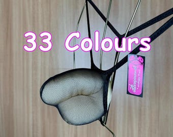 May include: Black lingerie with a net design, displayed on a gold-colored wire frame. The text "33 Colours" is visible in the image. A tag with the text "Jovanadesign" is also present.