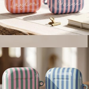 May include: A collection of rectangular earbud cases featuring vertical stripes in various color combinations including blue and light blue, yellow and pink, green and pink, and orange and pink. Each case is personalized with a white script name.
