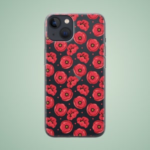 May include: A clear phone case with a red poppy flower pattern on a black background. The case has a cutout for the camera lens.