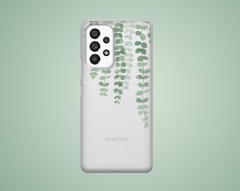 May include: A clear phone case with a design of green leaves hanging down. The case has the word "SAMSUNG" printed on the back.