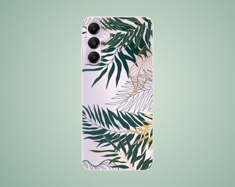 May include: A white phone case with a tropical leaf design. The leaves are green and gold and have a detailed outline. The phone case has a triple camera lens.