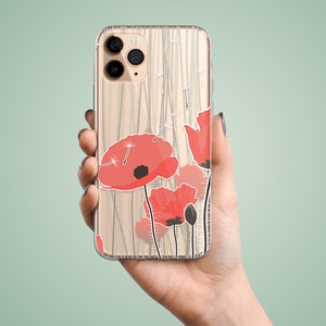 May include: A clear phone case with a wood grain pattern and red poppy flowers printed on it.