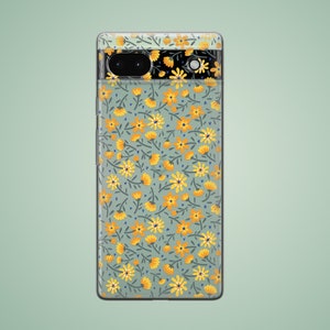 The preview shows a case on a green Google Pixel. The case is clear and transparent with small yellow flowers and green stems.