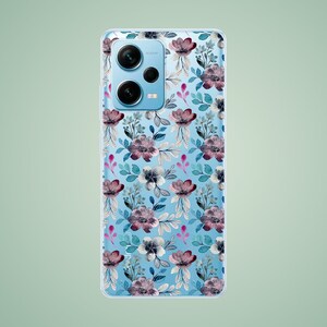 The preview shows a case on a light blue RedMi. The case is clear and transparent with blue and purple flowers print.