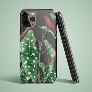 Clear phone case with an illustrated begonia polka dot. The begonia leaves are green on top and burgundy on the bottom.  The preview shows the case on a black iPhone device.