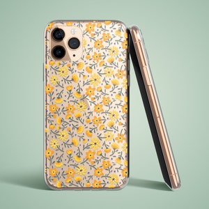 The preview shows a case on a gold iPhone. The case is clear and transparent with small yellow flowers and green stems.