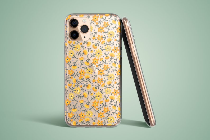 The preview shows a case on a gold iPhone. The case is clear and transparent with small yellow flowers and green stems.