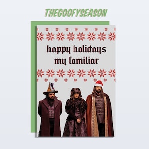 May include: A Christmas card featuring three people dressed in dark clothing with a red and white snowflake pattern background. The text on the card reads "happy holidays my familiar".