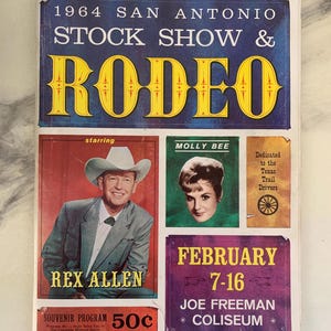 May include: A vintage program for the 1964 San Antonio Stock Show & Rodeo, featuring Rex Allen and Molly Bee. The program is purple, yellow, and red with the text "February 7-16 Joe Freeman Coliseum" and "Souvenir Program 50c".