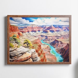 Op de afbeelding: Een ingelijst aquarel schilderij van de Grand Canyon, met een kronkelende rivier die door de canyon stroomt. Het schilderij toont een levendige blauwe lucht met pluizige witte wolken, en de canyonwanden zijn een mix van rode, oranje en bruine tinten.