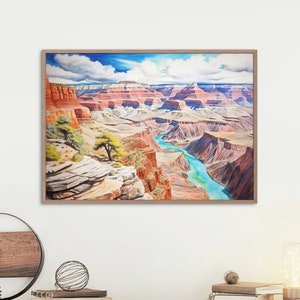 Op de afbeelding: Een ingelijst aquarel schilderij van de Grand Canyon, met een kronkelende rivier door de canyon en een blauwe lucht met witte wolken.
