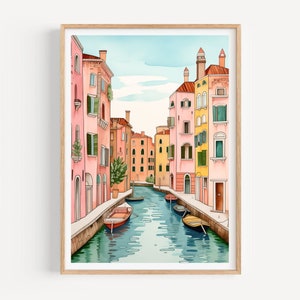 May include: A watercolor painting of a canal in Venice, Italy. The canal is lined with colorful buildings, some of which have balconies and windows. There are boats in the canal, and the water is a light blue color.