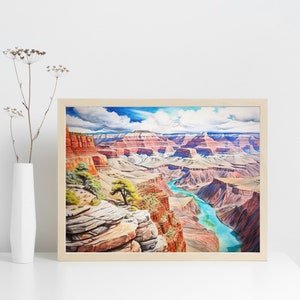 Op de afbeelding: Een ingelijst aquarel schilderij van de Grand Canyon, met een kronkelende rivier en gelaagde rotsformaties in tinten rood, oranje en bruin. De lucht is helderblauw met pluizige witte wolken.