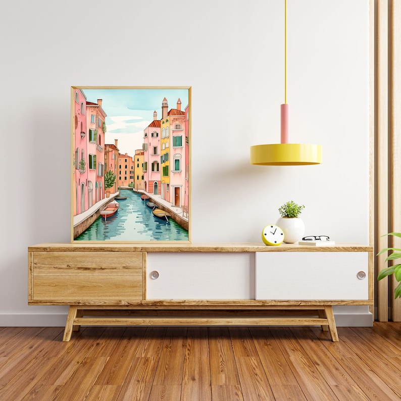 May include: A watercolor painting of a canal in Venice, Italy. The canal is lined with colorful buildings, and there are gondolas floating in the water.