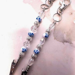 Atm card clip , Spring flower blue ,Key chain, long nail helper, crystal ceramic clip bracelet buddy , bracelet helper