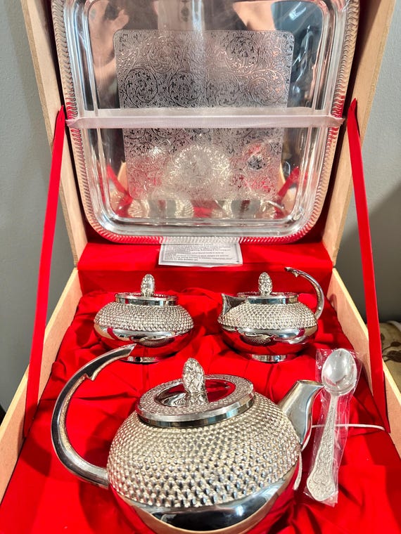 Bring timeless beauty to your table with this handcrafted silver plated tea set from Moradabad India the world’s “Brass City