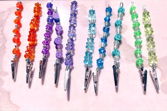 Atm card clip Flash sale , long nail helper, bracelet buddy, bracelet helper . dice, gummy bare, smiley