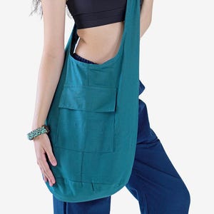 Sac à bandoulière bohème en coton avec poche avant. Léger, confortable et spacieux, parfait pour les voyages, les festivals, les courses et un usage quotidien !