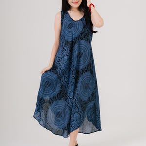 Rainbow print maxi dress for women, sleeveless design ideal for travel and hot climates. Casual yet stylish.