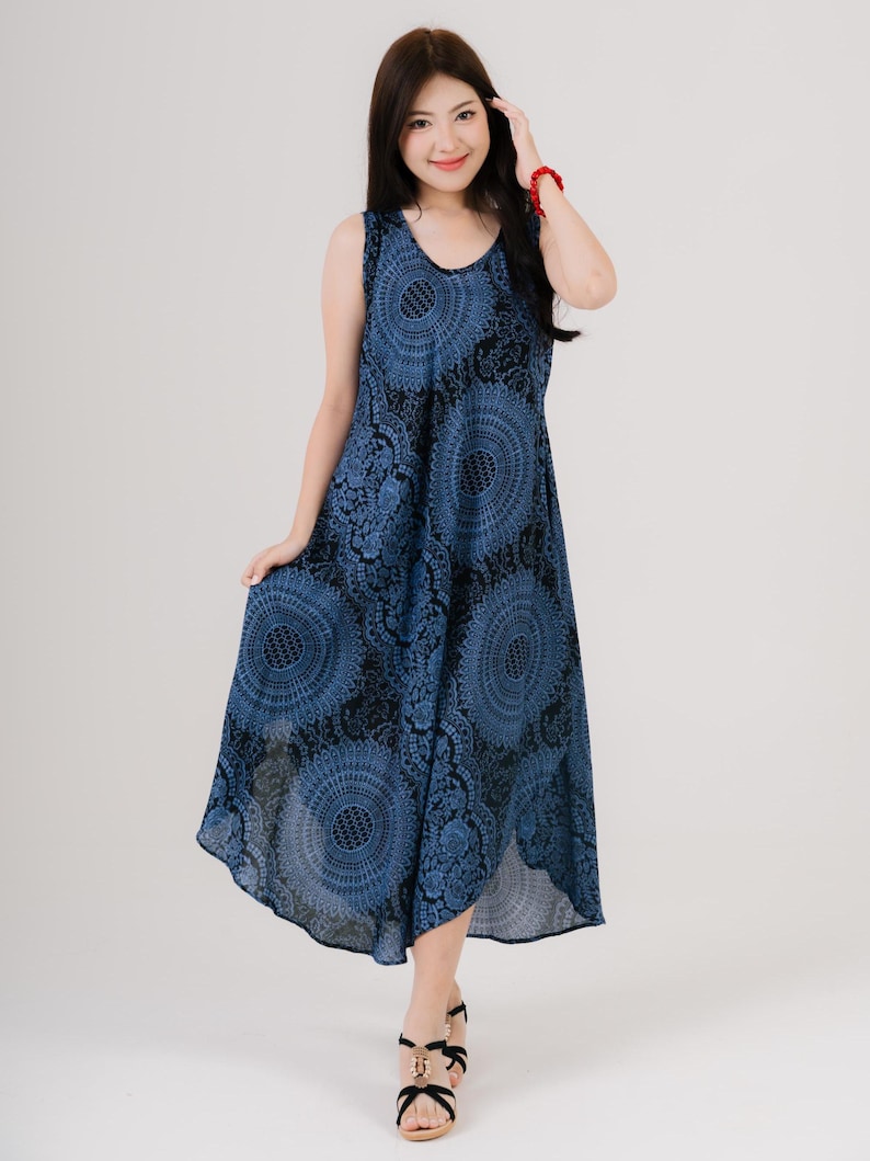Rainbow print maxi dress for women, sleeveless design ideal for travel and hot climates. Casual yet stylish.