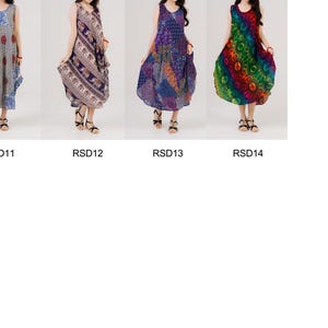 Lightweight sleeveless dressed in rainbow print. A flattering summer staple for women who love bold, colorful fashion.