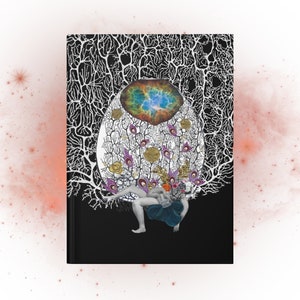 Black hardcover notebook (front) with collage artwork featuring a figure with a baby, goddess imagery, a drawing of a neuron, floral imagery and a photo of a galaxy