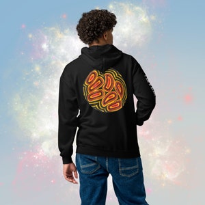 May include: Black hooded sweatshirt with a circular graphic on the back. The graphic features a yellow, orange, and red design with a black outline.