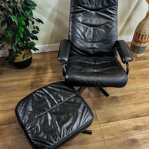 Skoghaug Leather Swivel Chair with matching Footstool