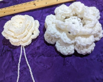 A pair of  3D Crocheted Flowers for crafting and decorating