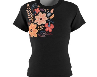 May include: Black t-shirt with a floral design on the left side of the chest. The design features a variety of flowers in shades of orange, pink, and yellow.