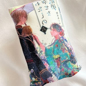 May include: A white canvas pouch with a colorful anime illustration of two people. The text on the pouch reads "桜  咲く  時の  桜  咲く  時  -  藤木  ゆたか - "