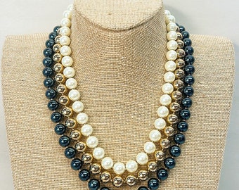 Fabric faux pearl necklace cluster set by Charter Club.