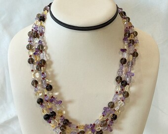 Vintage designer necklace tagged KD handmade in California with garnet & oitrine stones