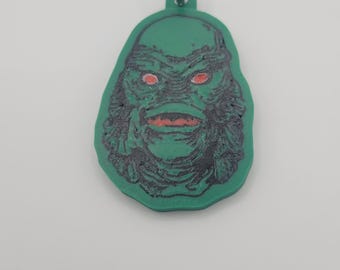 Dubbelzijdig Creature From The Black Lagoon-sleutelhanger: 3D-geprint.