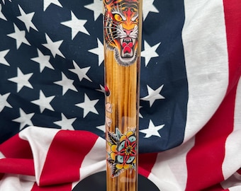 Houten puttergreep met tattoo-thema