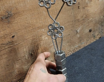 Free standing welded metal flower