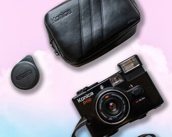 Konica Pop Hexanon with lens cap, strap and case.