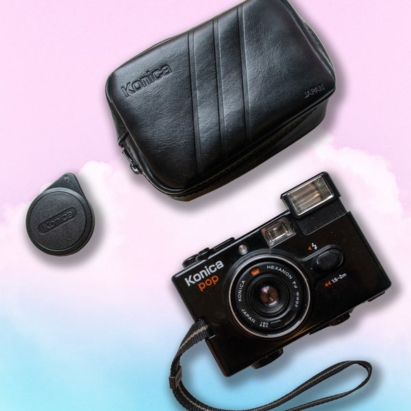 Konica Pop Hexanon with lens cap, strap and case.